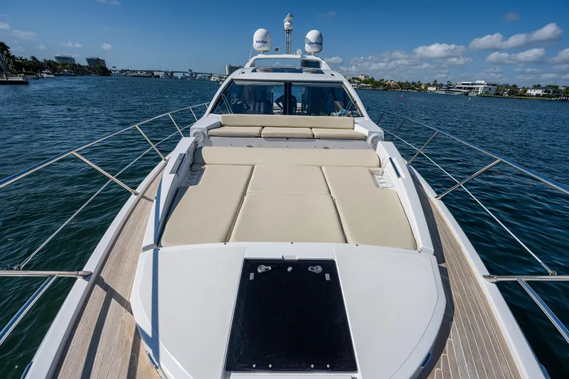  Yacht Photos Pics Azimut 55S 2014 yacht on water, featuring spacious deck and luxurious seating.