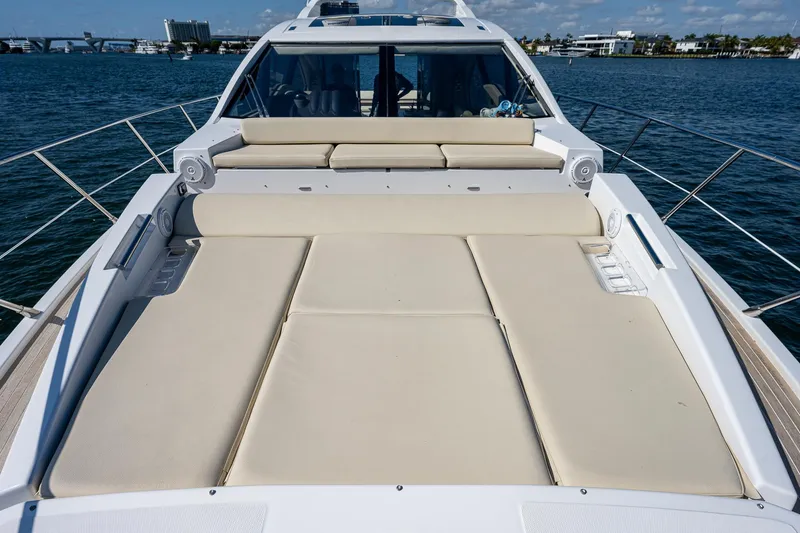  Yacht Photos Pics 2014 Azimut 55S yacht with spacious sunbathing deck on calm waters.