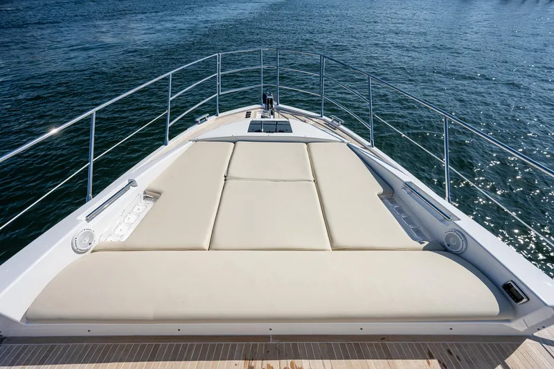  Yacht Photos Pics 2014 Azimut 55S yacht with spacious sunbathing deck on calm water.