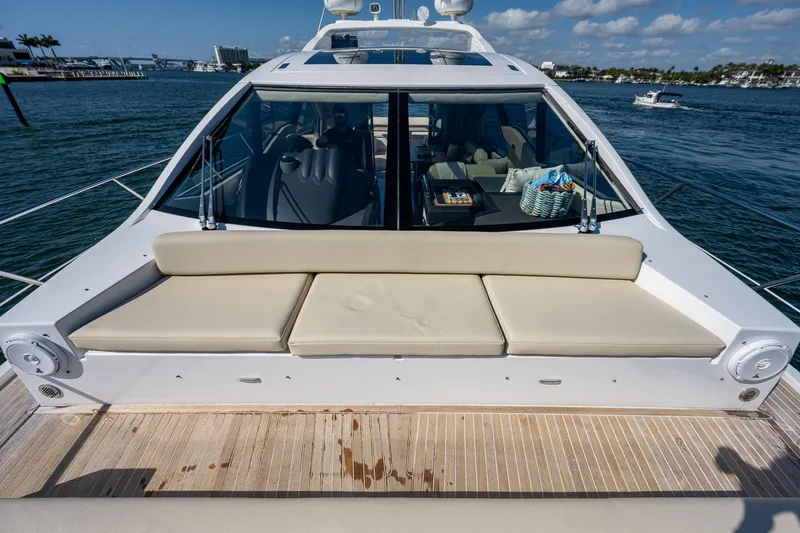  Yacht Photos Pics 2014 Azimut 55S yacht with beige seating, docked on a sunny day.