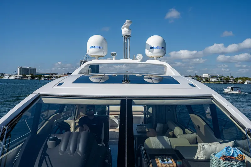  Yacht Photos Pics 2014 Azimut 55S yacht with Intellian domes, cruising on a sunny day.