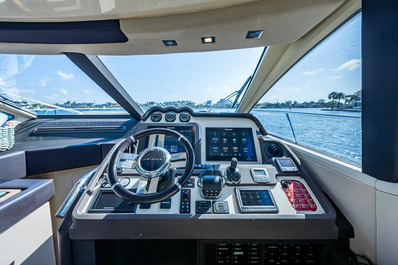  Yacht Photos Pics Cockpit of 2014 Azimut 55S yacht with modern controls and scenic water view.