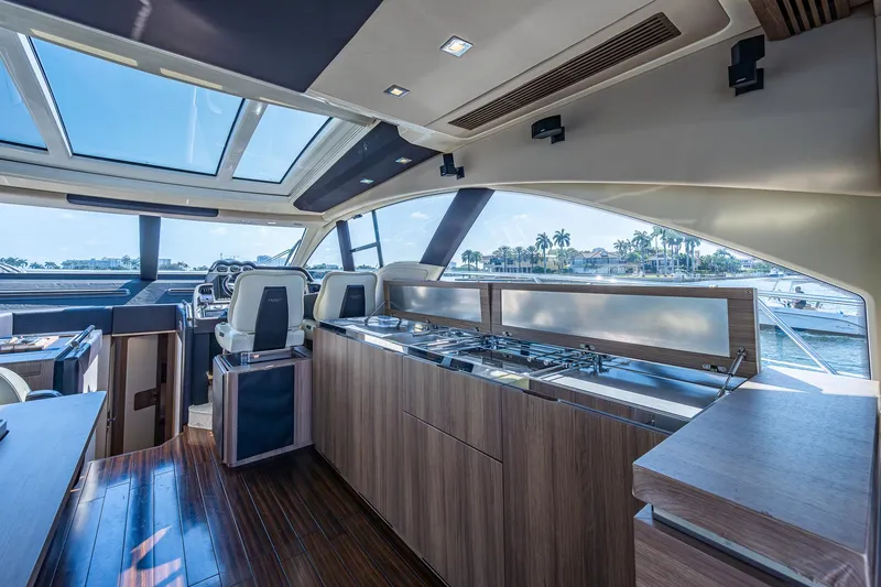 Yacht Photos Pics Luxurious interior of a 2014 Azimut 55S yacht with modern design and panoramic windows.