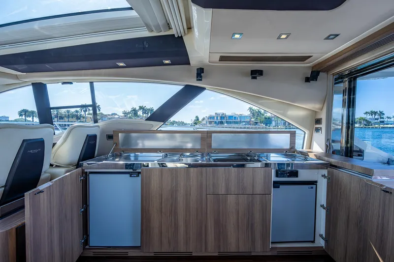  Yacht Photos Pics Luxurious interior of 2014 Azimut 55S yacht with modern kitchen and scenic view.