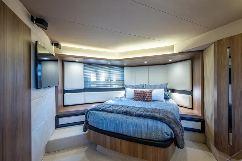  Yacht Photos Pics Luxurious bedroom interior of 2014 Azimut 55S yacht with modern design and cozy bedding.