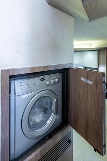  Yacht Photos Pics 2014 Azimut 55S yacht interior with built-in washing machine.