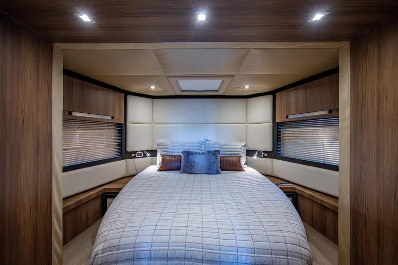  Yacht Photos Pics Luxurious bedroom interior of 2014 Azimut 55S yacht with modern design and cozy bedding.