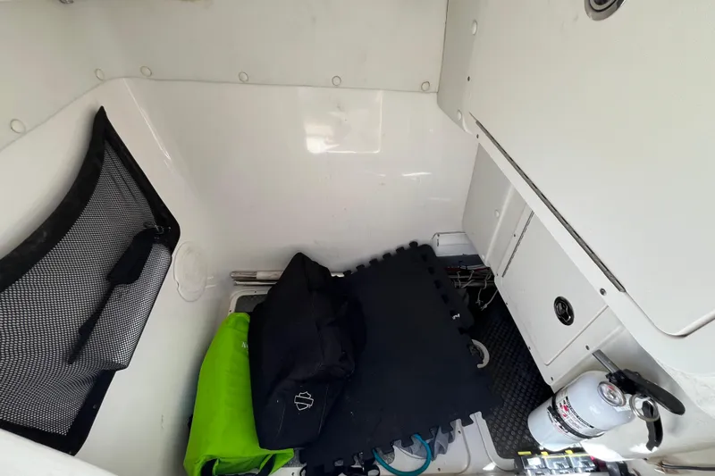  Yacht Photos Pics Interior storage compartment of a 2020 World Cat 296 DC boat with gear and equipment.