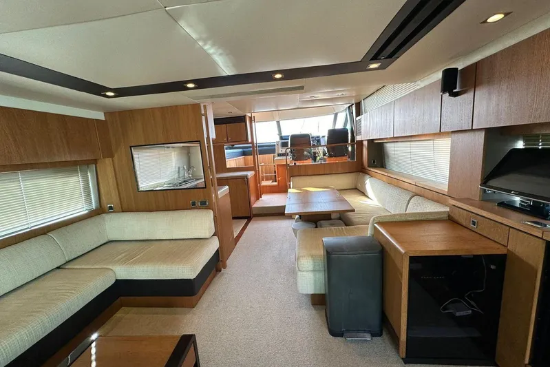  Yacht Photos Pics Luxurious interior of 2014 Fairline Squadron 65 yacht with modern furnishings and spacious layout.