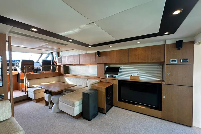  Yacht Photos Pics Luxurious interior of 2014 Fairline Squadron 65 yacht with modern furnishings and entertainment system.