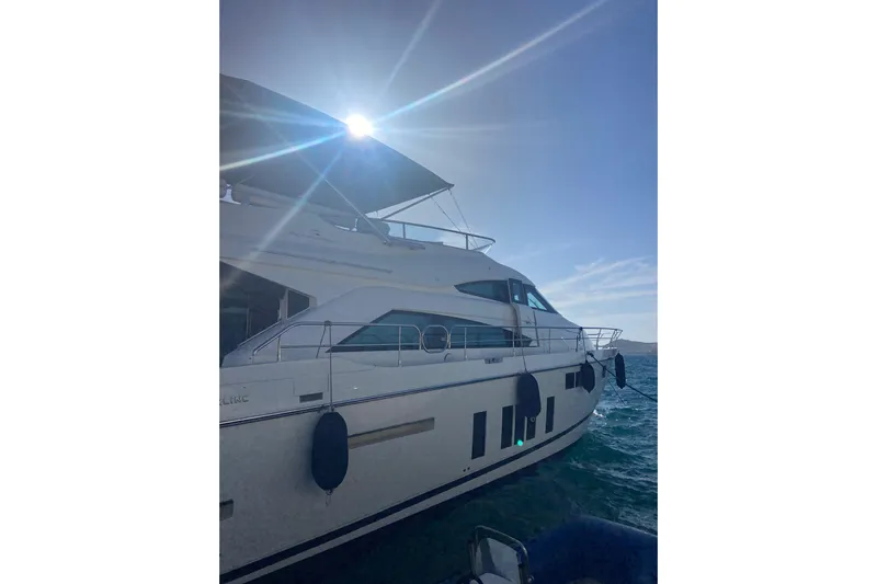  Yacht Photos Pics 2014 Fairline Squadron 65 yacht on sunny ocean waters.