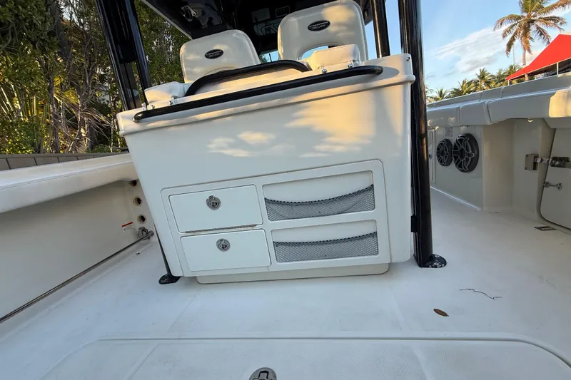  Yacht Photos Pics 2015 Hydra-Sports 3400 CC boat interior with storage compartments and seating.