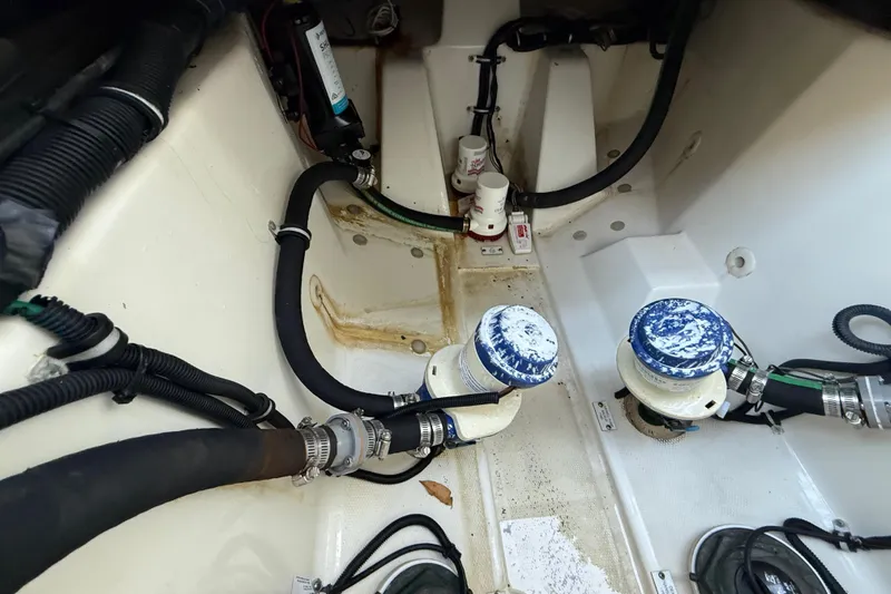  Yacht Photos Pics Bilge area of a 2015 Hydra-Sports 3400 CC boat, showing hoses and fittings.