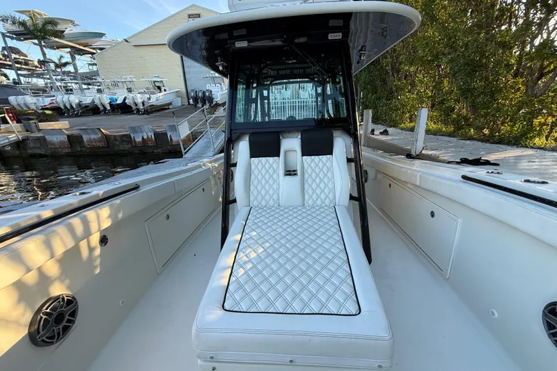  Yacht Photos Pics 2015 Hydra-Sports 3400 CC boat with luxurious seating and sleek design at a marina.
