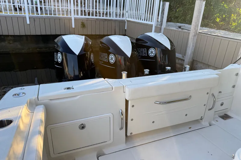  Yacht Photos Pics 2015 Hydra-Sports 3400 CC boat with triple Yamaha outboard engines docked.