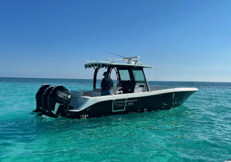  Yacht Photos Pics 2015 Hydra-Sports 3400 Center Console boat on clear blue water.