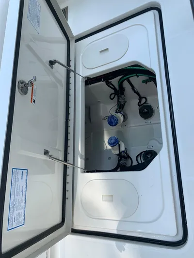  Yacht Photos Pics Open hatch of 2015 Hydra-Sports 3400 Center Console showing internal components.