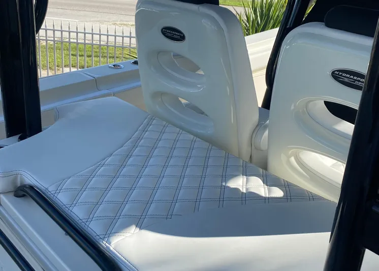  Yacht Photos Pics 2015 Hydra-Sports 3400 Center Console boat seating with white upholstery and checkered pattern.