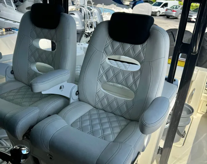  Yacht Photos Pics 2015 Hydra-Sports 3400 Center Console boat seats with diamond stitching and armrests.
