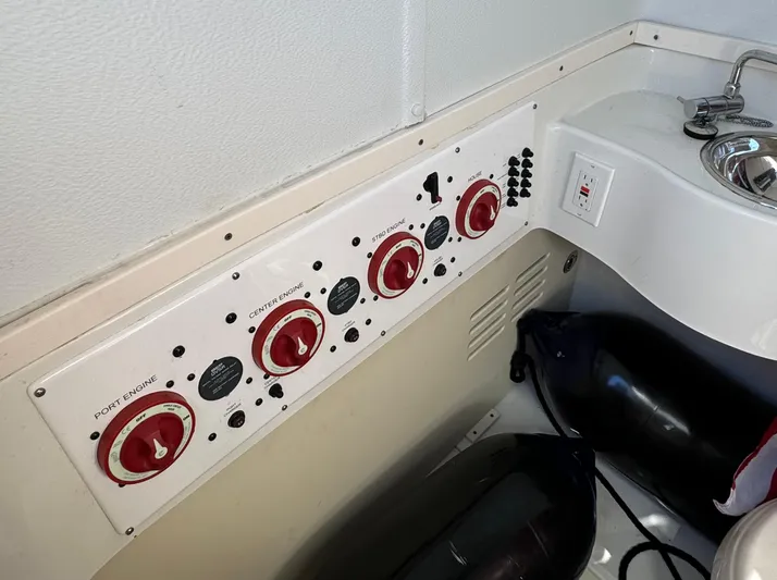  Yacht Photos Pics Control panel of a 2015 Hydra-Sports 3400 Center Console boat with engine switches.