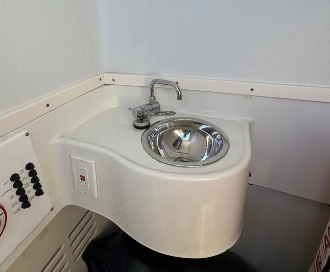  Yacht Photos Pics Compact sink area on 2015 Hydra-Sports 3400 Center Console boat.