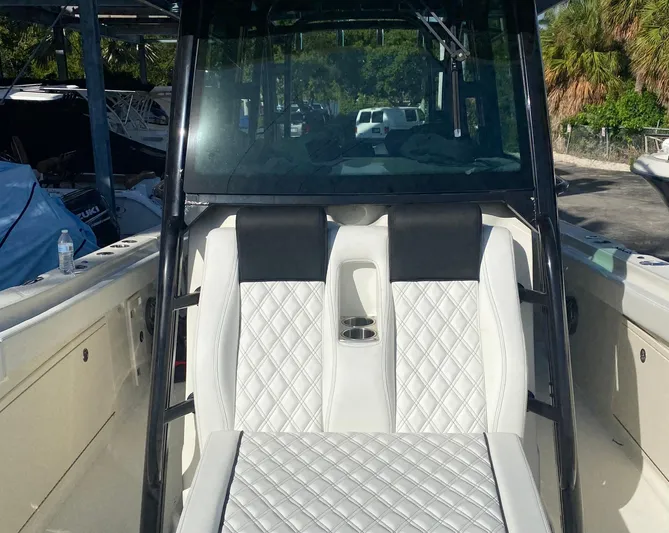  Yacht Photos Pics 2015 Hydra-Sports 3400 Center Console boat with white quilted seating and cup holders.