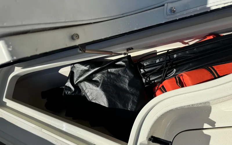  Yacht Photos Pics Storage compartment of 2015 Hydra-Sports 3400 Center Console with gear and equipment.