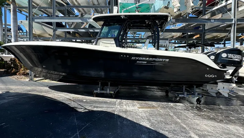 Yacht Photos Pics 2015 Hydra-Sports 3400 Center Console boat on display, featuring sleek black design.