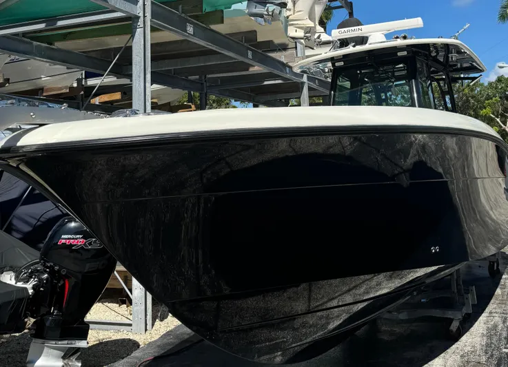  Yacht Photos Pics 2015 Hydra-Sports 3400 Center Console boat with Mercury Pro XS engine in storage.