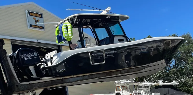  Yacht Photos Pics 2015 Hydra-Sports 3400 Center Console boat with Yamaha engines, docked near marine fuel station.