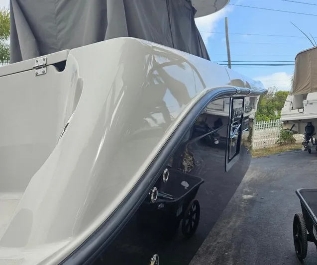  Yacht Photos Pics 2015 Hydra-Sports 3400 Center Console boat, sleek design, parked outdoors.