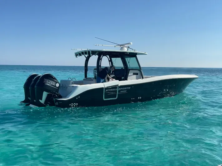  Yacht Photos Pics 2015 Hydra-Sports 3400 Center Console boat on clear blue water.