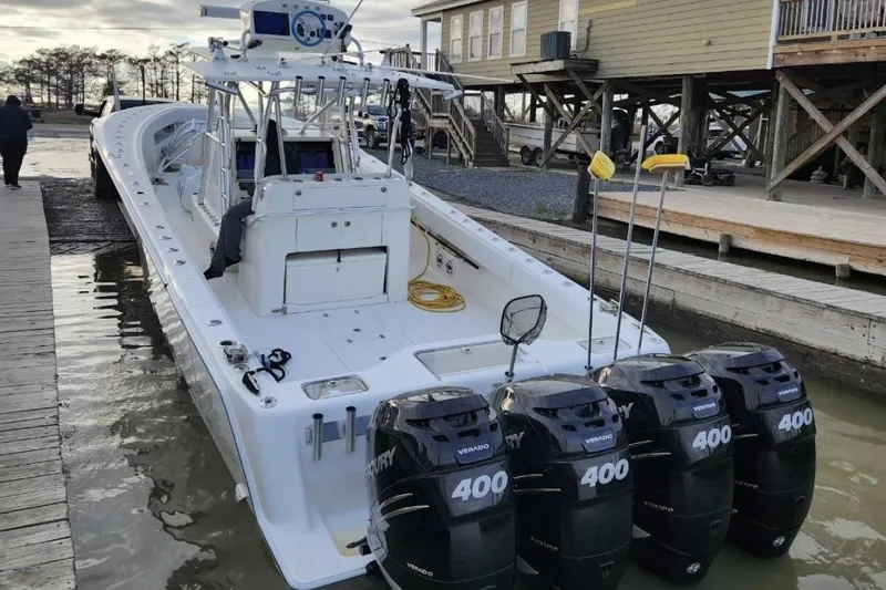  Yacht Photos Pics 2019 SeaVee 390Z boat with four Mercury 400 engines docked at a marina.