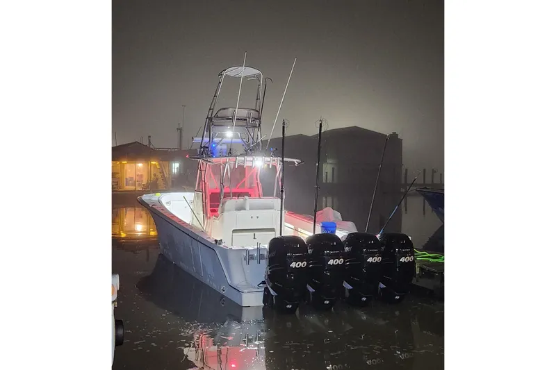  Yacht Photos Pics 2019 SeaVee 390Z boat with quad 400 engines docked at night.