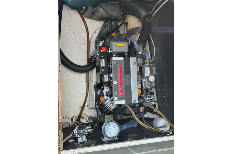  Yacht Photos Pics Engine compartment of a 1998 Fountaine Pajot Bahia 46 catamaran with Yanmar engine.