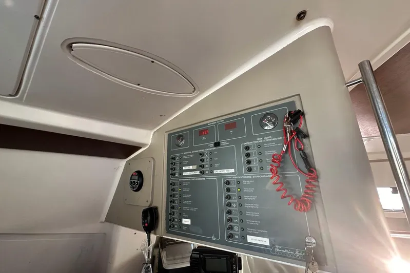  Yacht Photos Pics Control panel of a 1998 Fountaine Pajot Bahia 46 catamaran, featuring various switches and gauges.