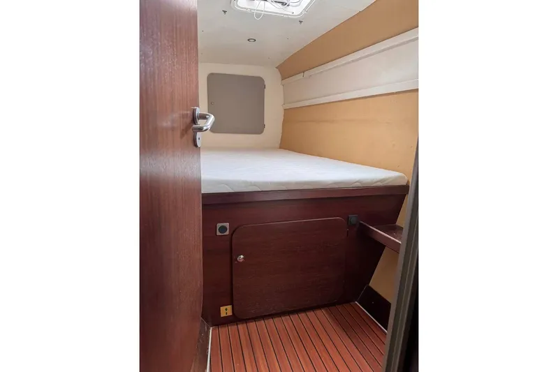  Yacht Photos Pics Cabin interior of 1998 Fountaine Pajot Bahia 46 catamaran with wooden flooring.