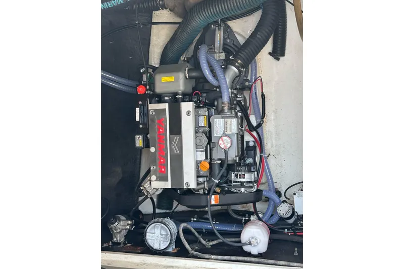  Yacht Photos Pics Yanmar engine in a 1998 Fountaine Pajot Bahia 46 catamaran, showcasing detailed components.