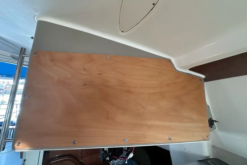  Yacht Photos Pics Interior view of a 1998 Fountaine Pajot Bahia 46 catamaran, featuring a wooden panel.