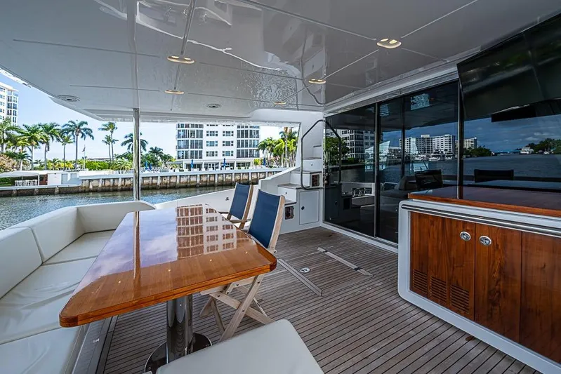 Lucky 7 Yacht Photos Pics Luxurious 2017 Azimut 80 yacht deck with elegant seating and waterfront view.