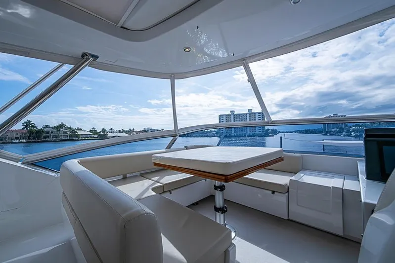 Lucky 7 Yacht Photos Pics Luxurious 2017 Azimut 80 yacht interior with panoramic ocean view and elegant seating area.