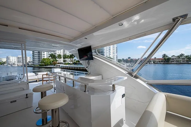 Lucky 7 Yacht Photos Pics Luxurious 2017 Azimut 80 yacht interior with bar and waterfront view.