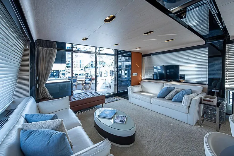 Lucky 7 Yacht Photos Pics Luxurious interior of 2017 Azimut 80 yacht with modern furnishings and large windows.