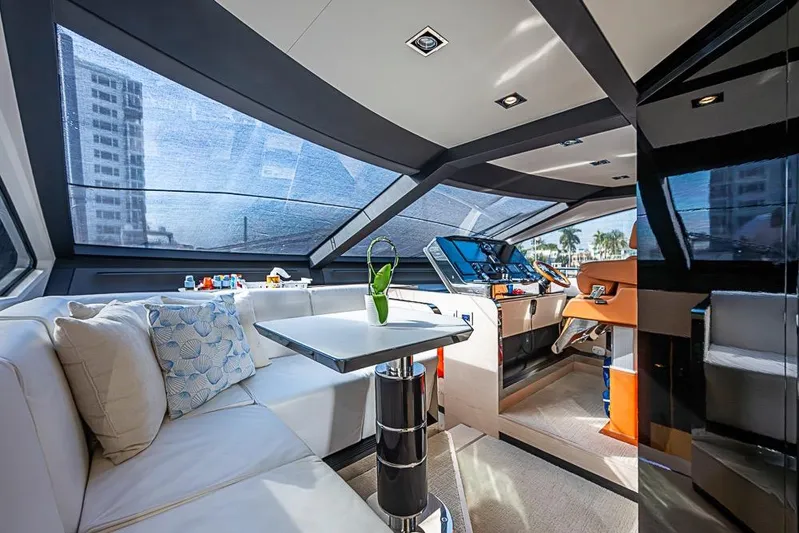 Lucky 7 Yacht Photos Pics Luxurious interior of 2017 Azimut 80 yacht with modern seating and helm.