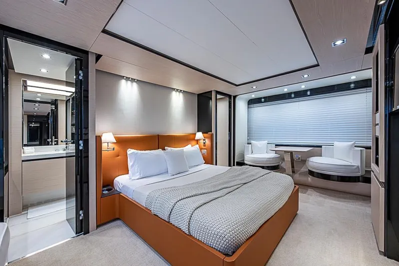 Lucky 7 Yacht Photos Pics Luxurious bedroom interior of 2017 Azimut 80 yacht with modern design and elegant furnishings.