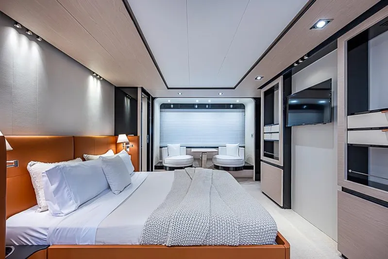 Lucky 7 Yacht Photos Pics Luxurious bedroom interior of 2017 Azimut 80 yacht with modern design and elegant furnishings.