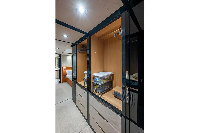 Lucky 7 Yacht Photos Pics Luxurious interior of 2017 Azimut 80 yacht with modern closet and bedroom view.