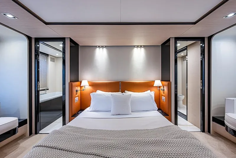 Lucky 7 Yacht Photos Pics Luxurious bedroom interior of 2017 Azimut 80 yacht with modern design and cozy ambiance.