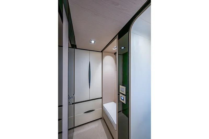 Lucky 7 Yacht Photos Pics Luxurious interior of 2017 Azimut 80 yacht, featuring sleek cabinetry and modern lighting.