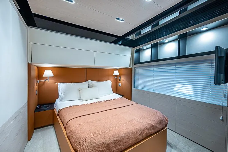 Lucky 7 Yacht Photos Pics Luxurious bedroom interior of 2017 Azimut 80 yacht with modern design and cozy lighting.